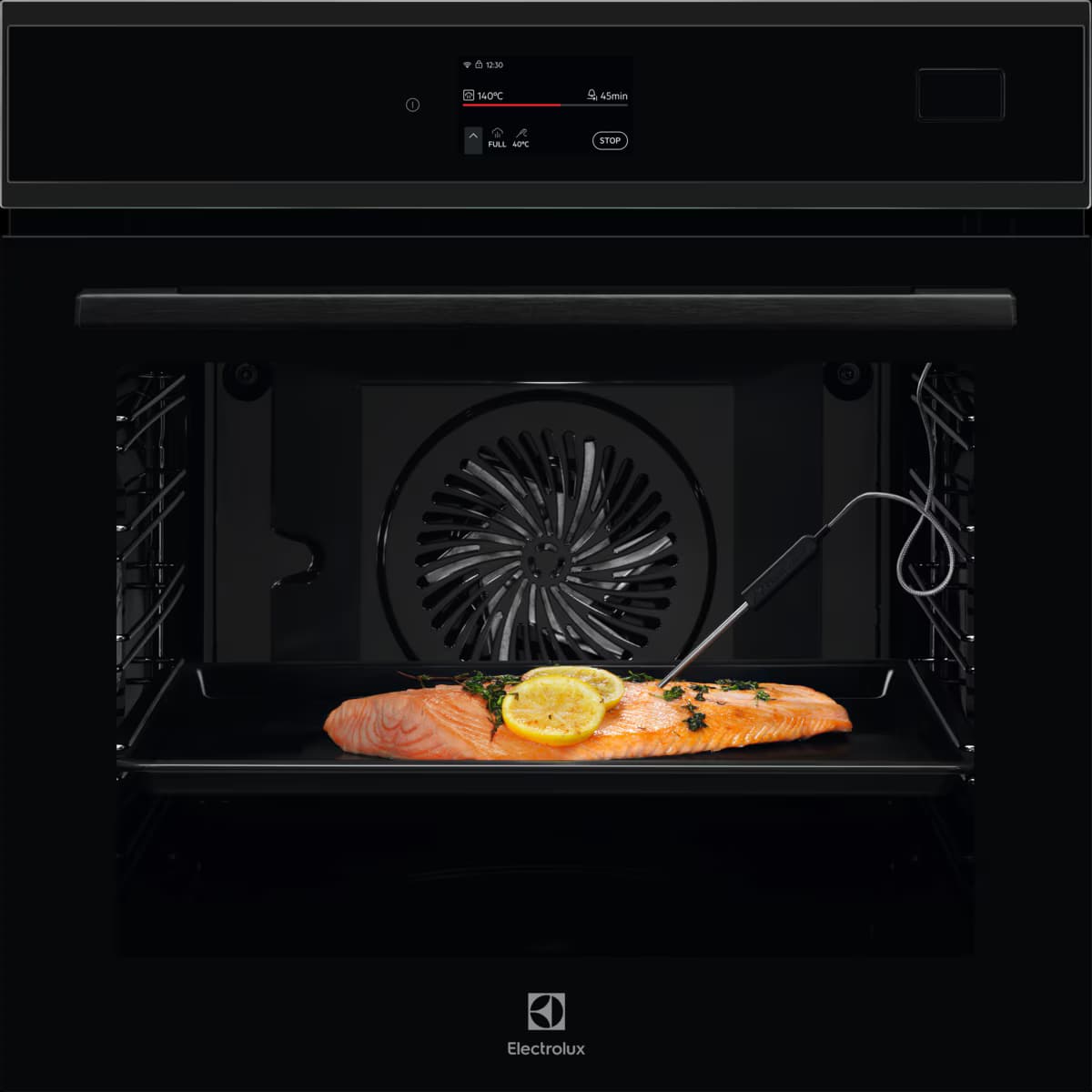 SteamBoost oven front view with prepared dishes